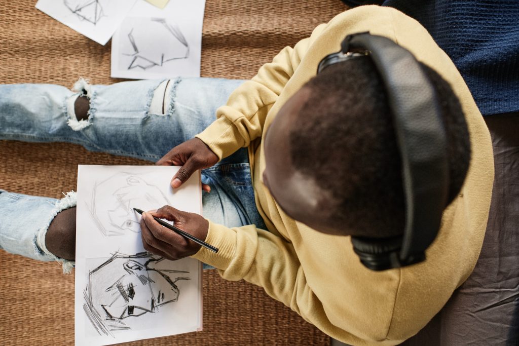 Creative drawing with music as a calming outlet—evidence-based alternatives to self-harm and coping strategies for self-injury.
